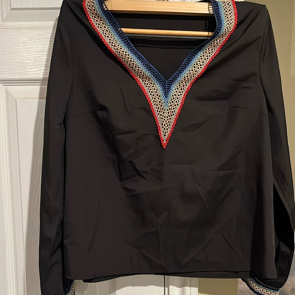 NWOT women’s black thin LS Shirt with detail edge.